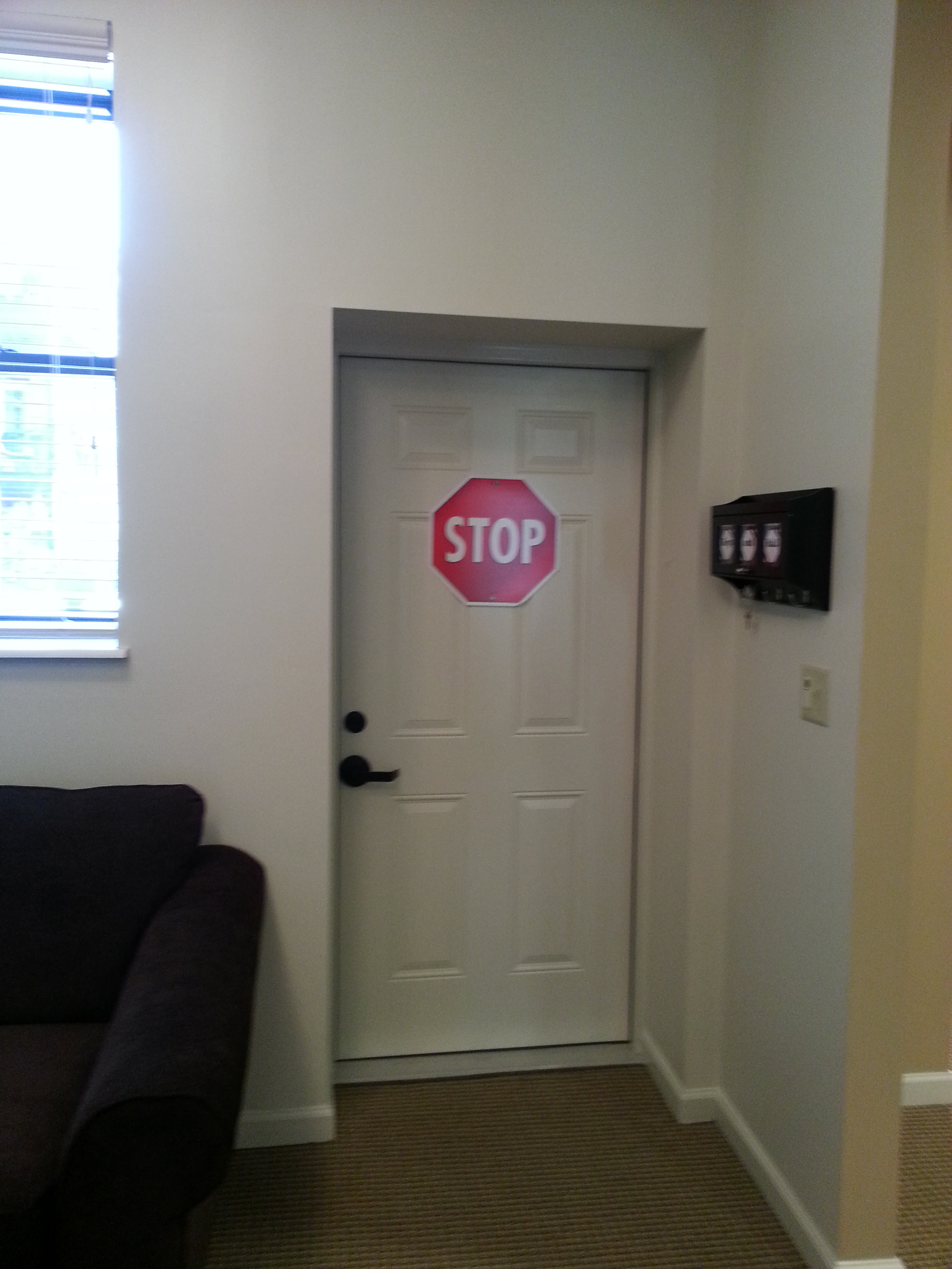 Memory Care home solutions 9 stop sign on door